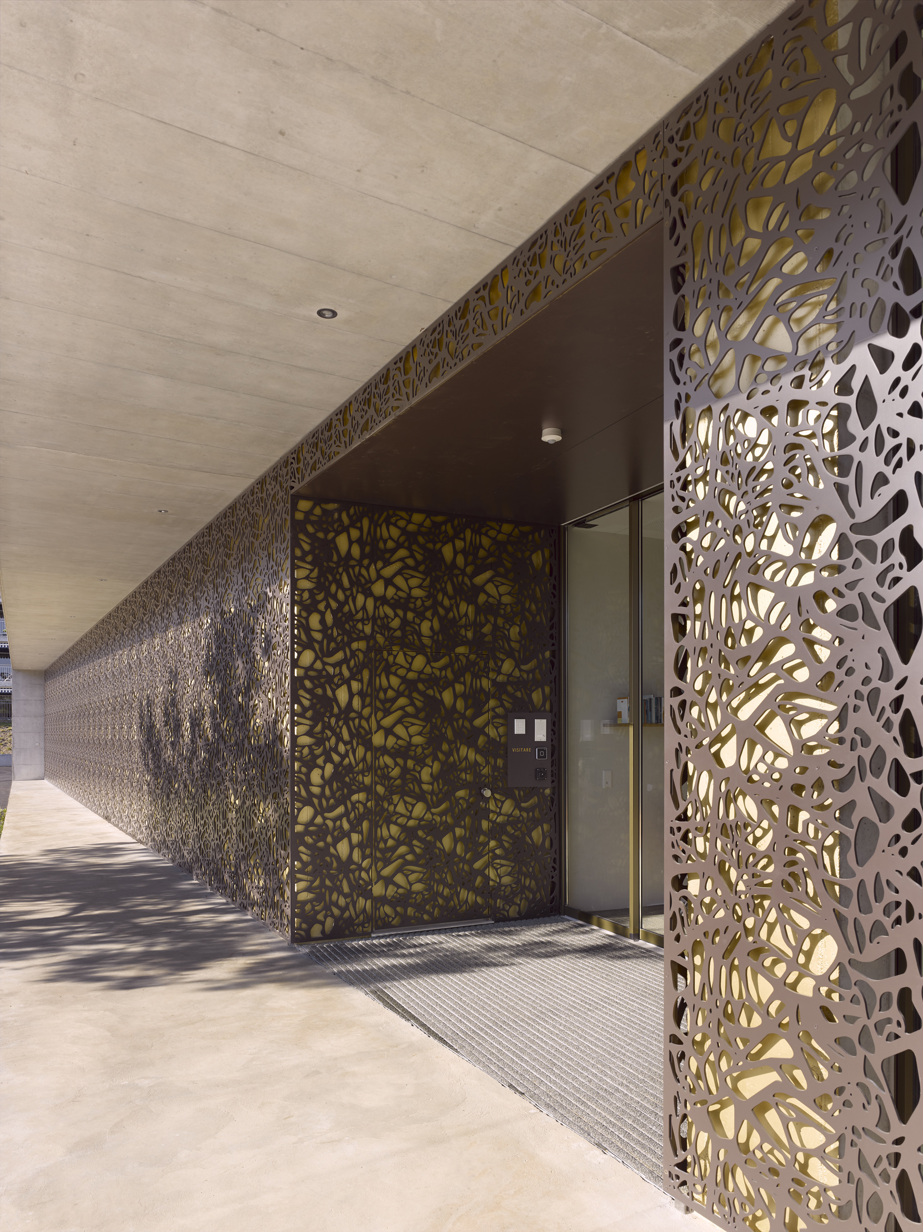 facade perforated cladding cellon appearance solothurn concrete overcomes delicate heavy bruag perforation messer photographer 8mm